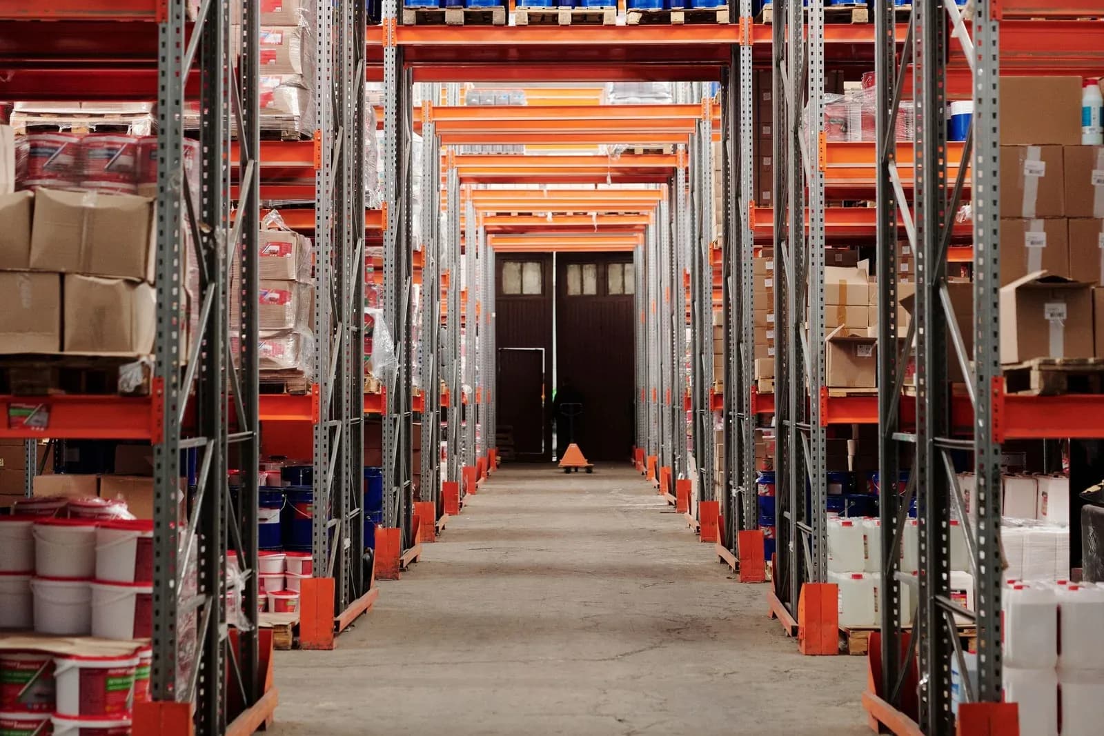 Organized warehouse shelving, stock and pallets